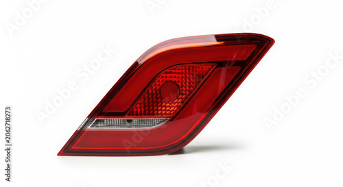 Brand new red automotive taillight assembly for modern vehicle lighting system, essential safety component part, isolated on white background. on white background