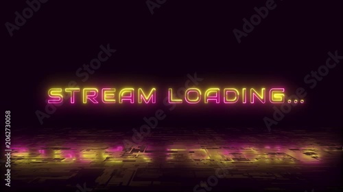 Neon pink and yellow glowing text Stream Loading pulses with a shake effect above a reflective circuit board floor with colored light cast below.
