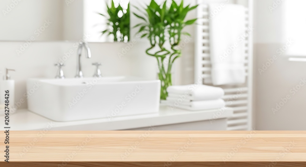 Fototapeta premium Modern bathroom countertop with lucky bamboo and white fixtures