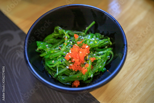 Japanese food featuring appetizingly sliced ​​fish, beautifully presented.