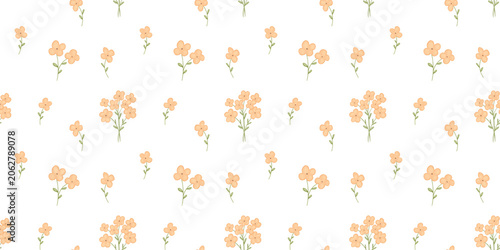 Watercolor seamless floral pattern with tiny blossoms bouquet on white background. Hand painted flower print for fabric, wallpaper, wrapping paper, and spring decor