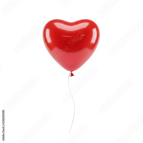 Red heart-shaped balloon floating in air