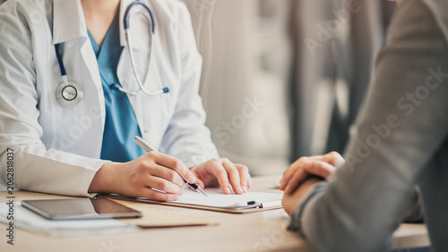 Medical appointment with doctor and patient
