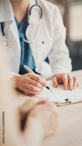 Medical appointment with doctor and patient