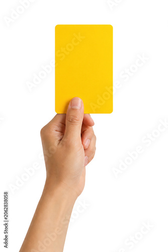 Canvastavla Hand holding a yellow referee card isolated on a white background, sports penalt