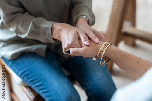 Tableau sur toile Comforting hands offering emotional support.