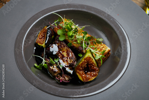 Close up of seared foie gras with figs and brioche toast