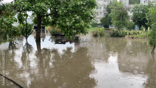 Emergency. Consequences of heavy rain: storm water has flooded the residential district, because of storm sewer malpractice. Engineers have failed design of rainwater disposal