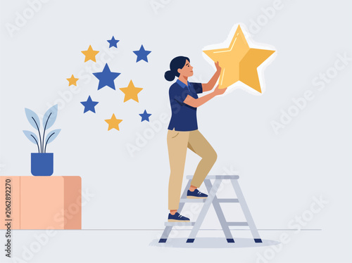 A woman on a stepladder places a large golden star on a wall adorned with smaller blue and yellow stars.