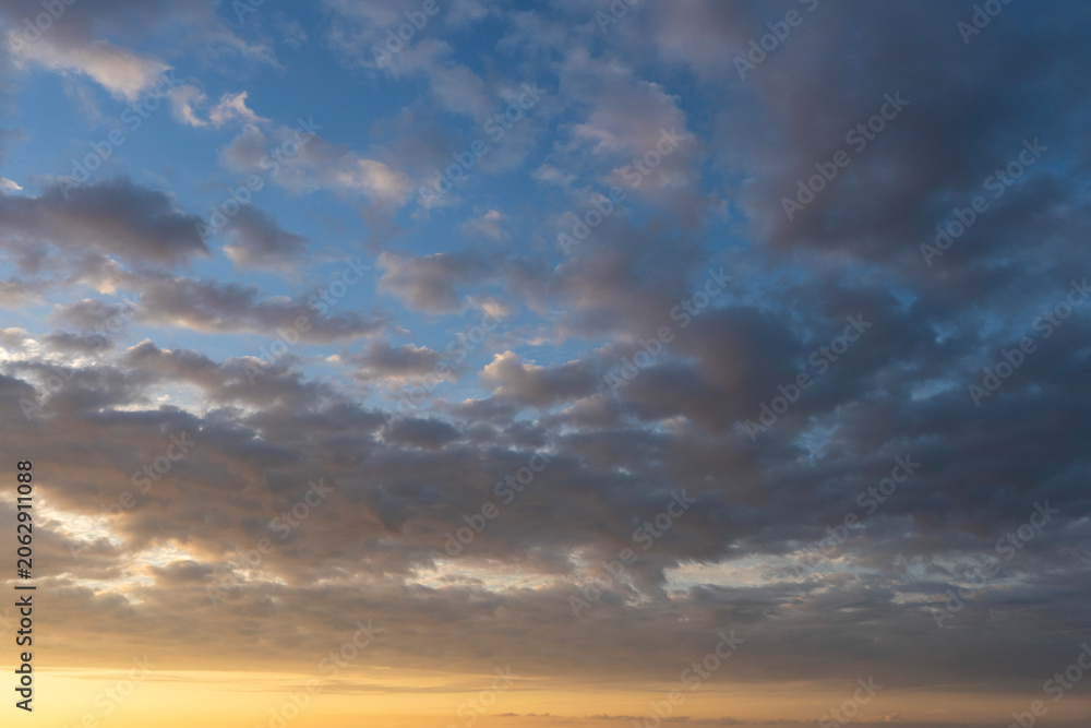 Fototapeta premium Sunset sky with beautiful clouds. Nature sky background.