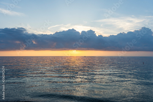 Beautiful sunset over the sea. Evening sea landscape.