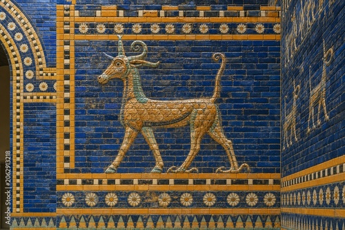 Reconstructed wall with glazed bricks depicting a patterned mythical beast.