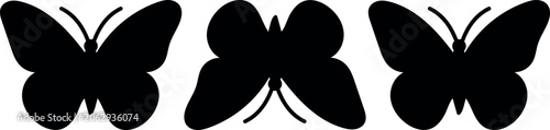 Schilderij op canvas A trio of stylized butterfly silhouettes rendered in solid black