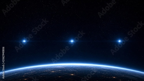 Foto Earth's curvature at night with three bright stars suspended in space