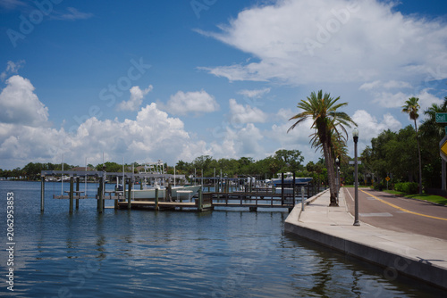 Photography Calm Tropical Marina and Waterfront Dock Under Blue Sky With Puffy Clouds View South from Snell Isle Bridge Coffeepot Bayou  in St