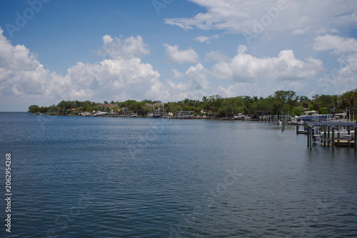 Photography Calm Tropical Marina and Waterfront Dock Under Blue Sky With Puffy Clouds View South from Snell Isle Bridge Coffeepot Bayou  in St