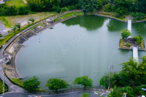 Aerial view of reservoir park with pedestrian bridges