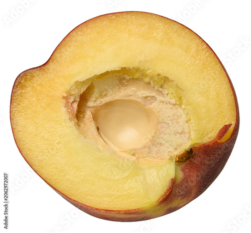 Foto A juicy half of a ripe smooth nectarine with a hole in the center from the stone