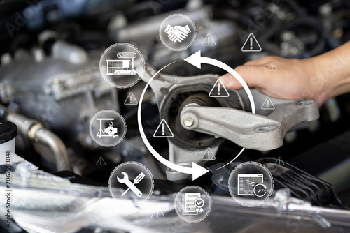 Fotografie Automotive maintenance concept, close-up of worn engine mount component with ins
