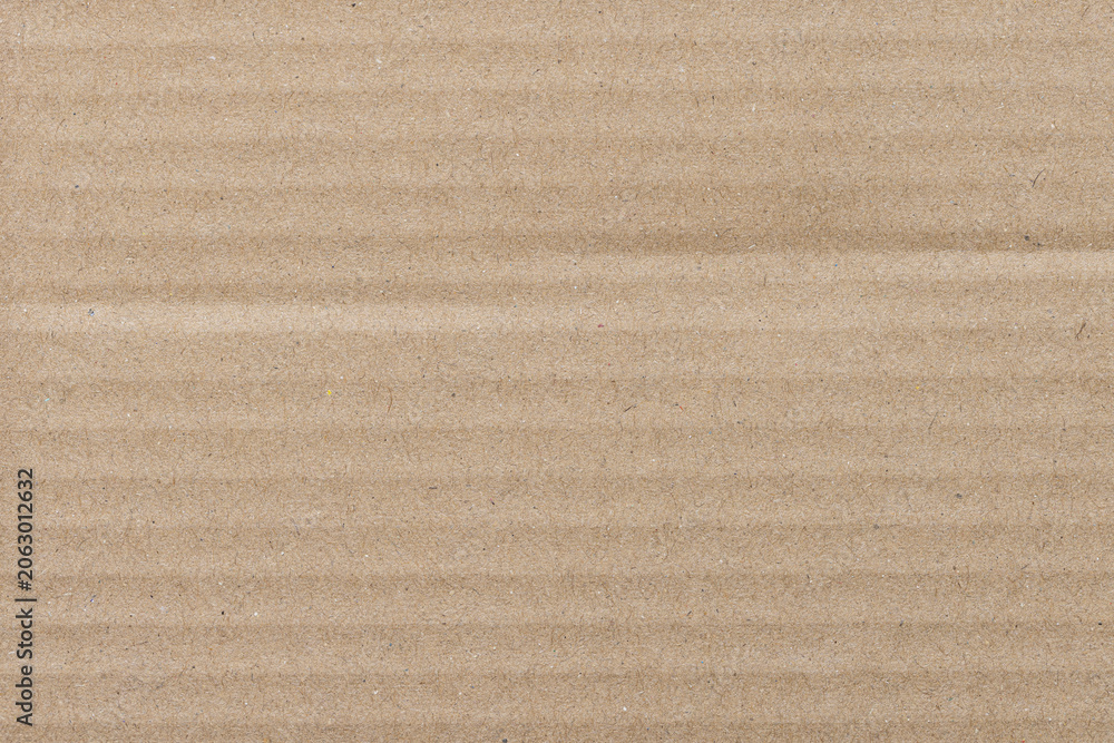 Fototapeta premium Brown Corrugated Cardboard Texture Background,Macro,A detailed close-up shot of a brown corrugated cardboard surface, featuring a textured pattern perfect for rustic, eco-friendly, or industrial.