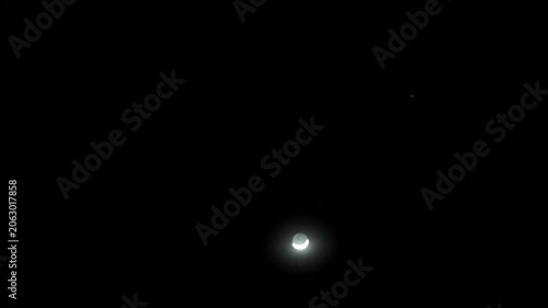 Bright full moon shining directly above clean energy solar panel farm at night 180fps Captured in Cinematic High Detail Footage