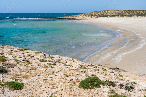 Scenic Mediterranean coastline featuring turquoise waters, unique kurkar cliffs, and diverse marine life, celebrated for its natural beauty and relaxing seaside ambiance.
