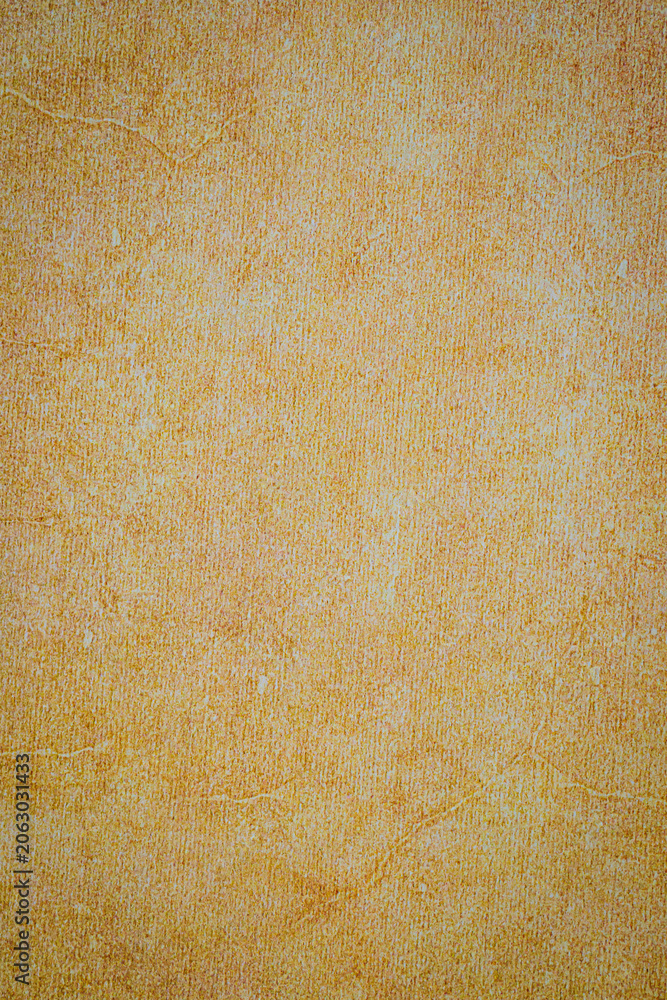 Fototapeta premium Texture of a light brown surface seen in indoor lighting during daytime