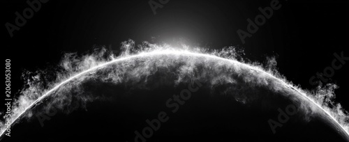 Planetary limb surrounded by bright evaporating gases in space