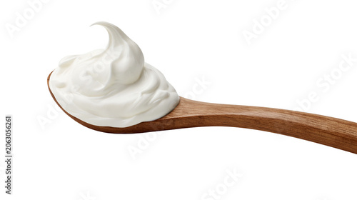 Photos Creamy white yogurt swirl on wooden spoon