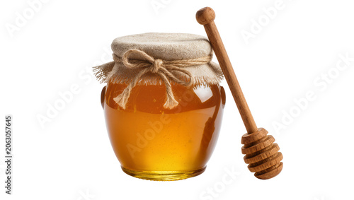 Принти на полотні Glass jar filled with golden honey and wooden dipper