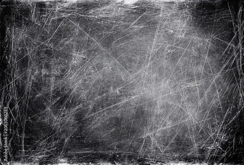 Heavily scratched metal surface with dense abrasion marks