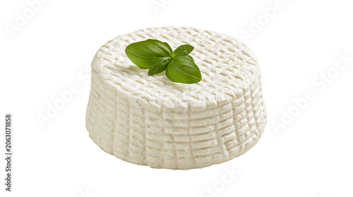 Tableau sur toile Fresh ricotta cheese wheel with basil leaf garnish
