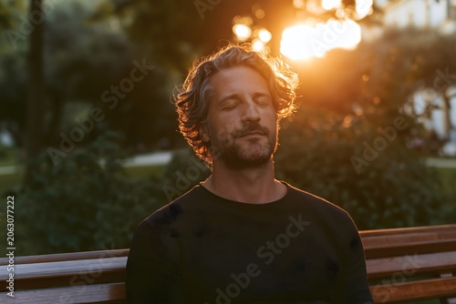 Man relaxing in nature without phone, mental health and digital detox concept

