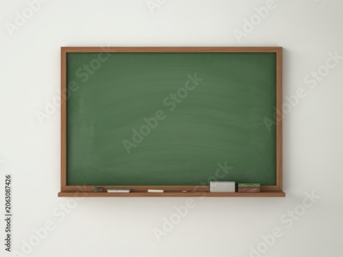 Vintage green chalkboard with wooden frame, blank school blackboard on white wall, classic classroom chalkboard with chalk and eraser