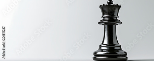 Elegant Black Chess Queen Piece Representing Strategic Leadership and Power on Neutral Background