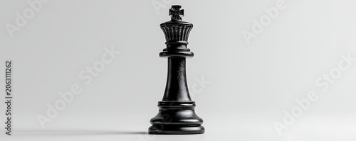 Black King Chess Piece on a White Background Studio Shot