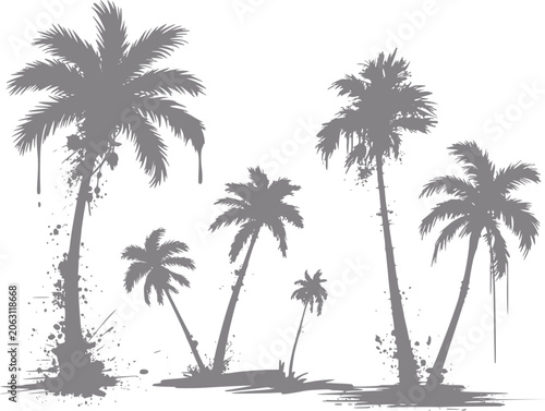Silhouette of palm trees with a grunge, splattered effect on white background