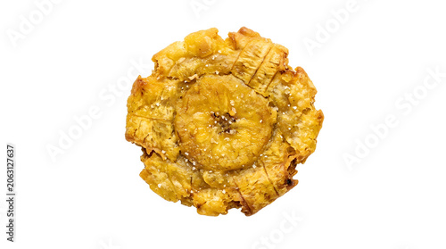 Crispy fried tostone green plantain slice with sea salt isolated on a solid white background