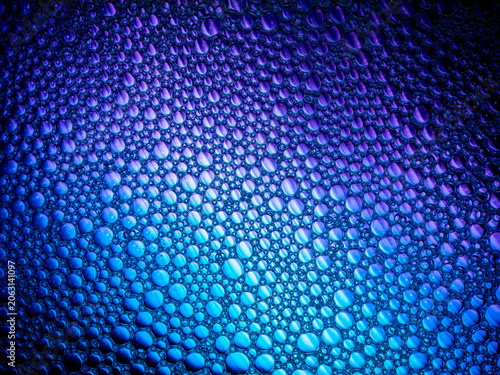 Blue foam texture with bubbles creating abstract background