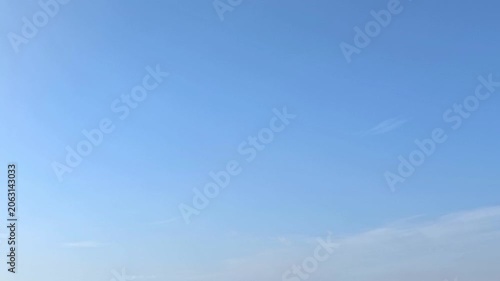 Cloudscape, Timelapse of Clear Blue Sky with Wispy Cirrus Clouds and Copy Space for Minimal Background Banner