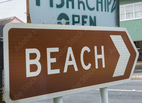 Direction sign to the beach in New Zealand