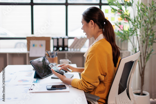 Photos Smiling businesswoman talking during a video conference, working in her home off