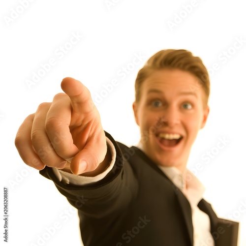Smiling Person Pointing Finger Toward Empty Direction for Advertising, Marketing and Copy Space. High-quality professional photograph featuring a happy smiling person pointing with their finger toward