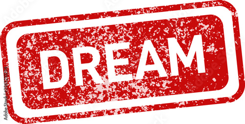 Distressed red rubber stamp with the word 'dream' isolated on white background