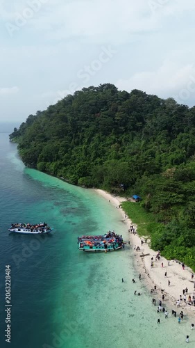 Aerial Of Crowded Tropical Island Beach With Tour Boats