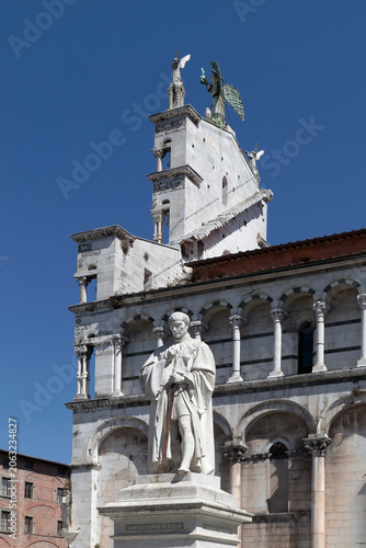 statue of politician and merchant francesco burlamacchi by giovanni dupre 1859 in the square outside the church of san michele in lucca tuscany italy sunny day