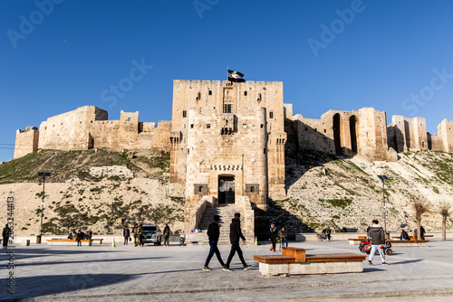 People Walking by Citadel of Aleppo Syria