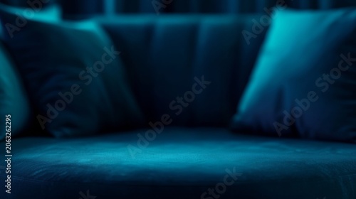 Luxury dark blue sofa backdrop with soft cushions for product placement