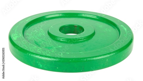 Green Weight Plate Showing Fitness and Strength