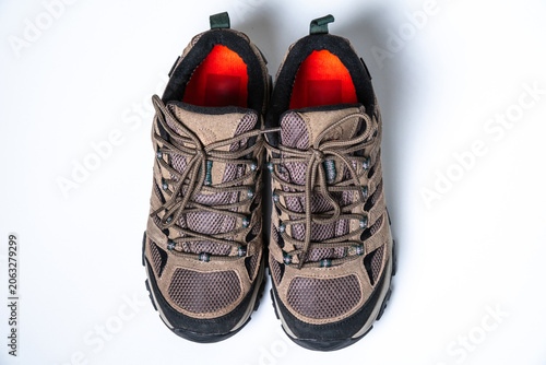Sturdy brown sports footwear designed for rugged mountain adventures and professional outdoor photography